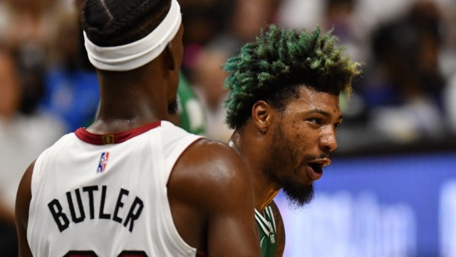 Boston Celtics guard Marcus Smart and Miami Heat guard Jimmy Butler
