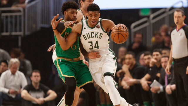 Boston Celtics guard Marcus Smart and Milwaukee Bucks forward Giannis Antetokounmpo