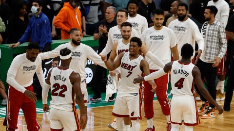 The Miami Heat bench celebrates
