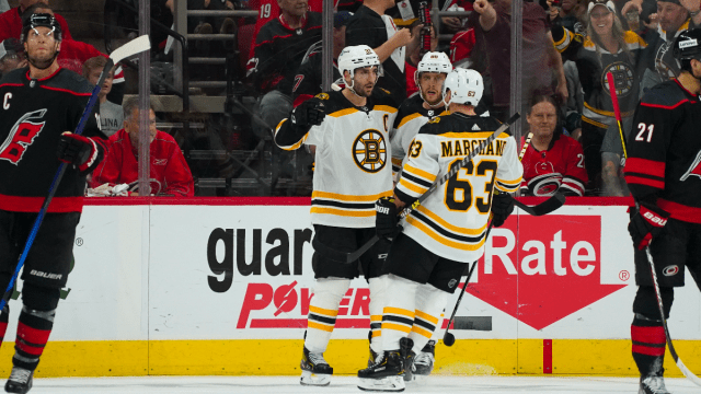 Boston Bruins center Patrice Bergeron and wings David Pastrnak and Brad Marchand