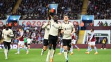 Liverpool forwards Sadio Mane (left) and Diogo Jota celebrate against Aston Villa