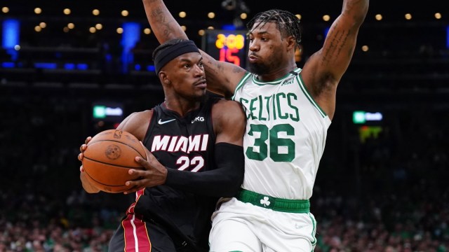 Boston Celtics guard Marcus Smart, Miami Heat forward Jimmy Butler