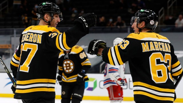 Boston Bruins forwards Patrice Bergeron and Brad Marchand