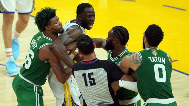 Boston Celtics forward Jaylen Brown, Golden State Warriors forward Draymond Green