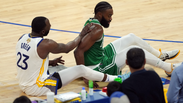Golden State Warriors forward Draymond Green and Boston Celtics guard Jaylen Brown