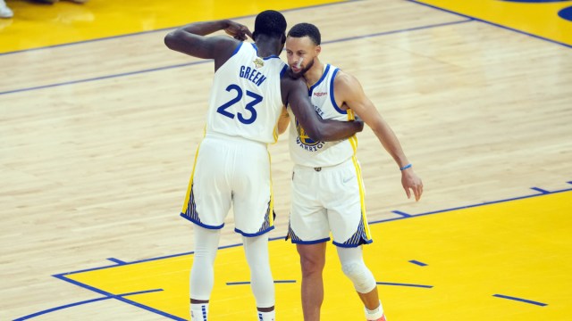 Golden State Warriors guard Stephen Curry and forward Draymond Green