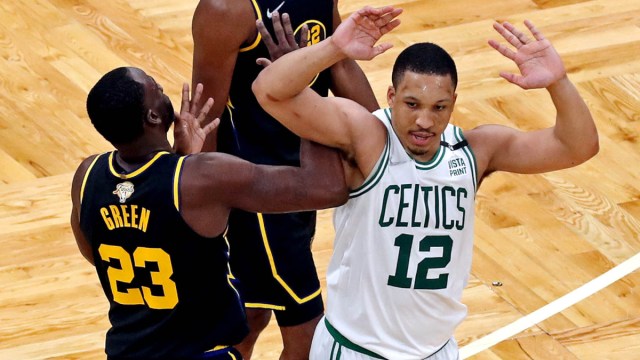 Boston Celtics forward Grant Williams and Golden State Warriors forward Draymond Green