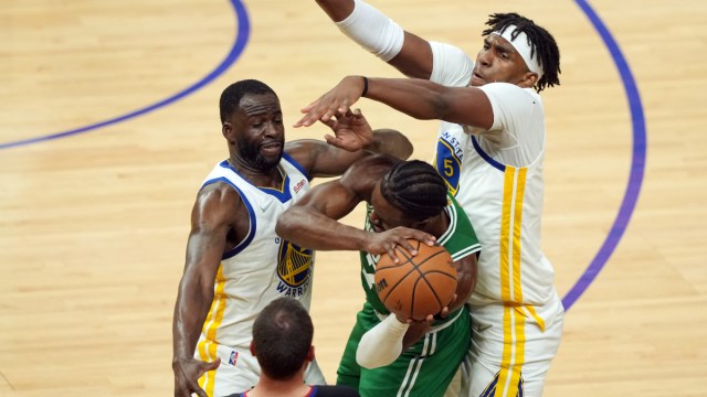 Boston Celtics guard Jaylen Brown and Golden State Warriors forwards Draymond Green and Kevon Looney