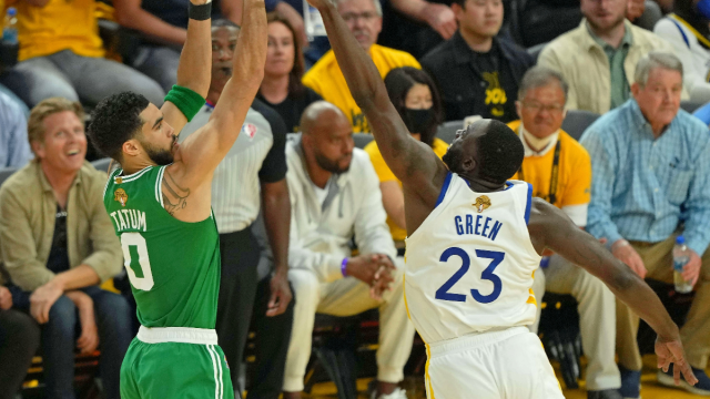 Boston Celtics forward Jayson Tatum and Golden State Warriors forward Draymond Green