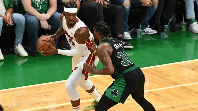 Miami Heat forward Jimmy Butler and Boston Celtics guard Marcus Smart