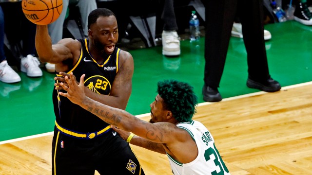 Boston Celtics guard Marcus Smart and Golden State Warriors forward Draymond Green