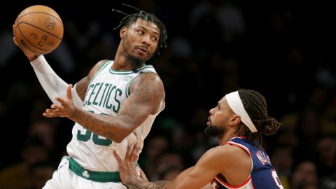 Boston Celtics guard Marcus Smart, Brooklyn Nets guard Patty Mills