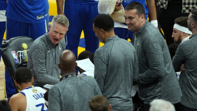 Golden State Warriors coach Steve Kerr and coaching staff