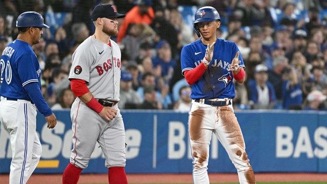 Boston Red Sox outfielder Christian Arroyo and Toronto Blue Jays first baseman Gosuke Katoh