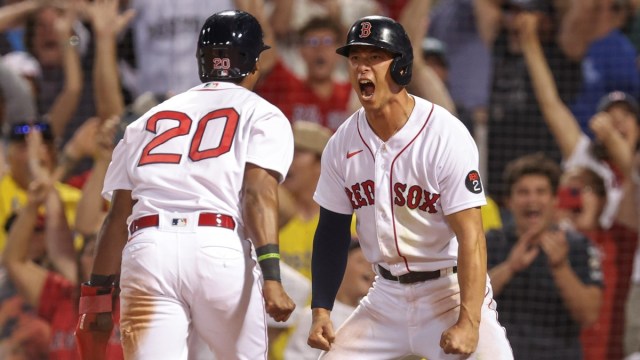 Boston Red Sox right fielder Rob Refsnyder (30), designated hitter Jeter Downs (20)