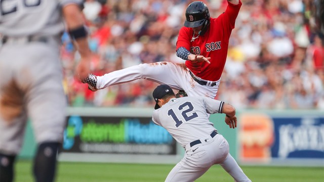 Boston Red Sox second baseman Trevor Story and New York Yankees shortstop Isiah Kiner-Falefa