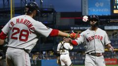 Boston Red Sox designated hitter J.D. Martinez and shortstop Xander Bogaerts