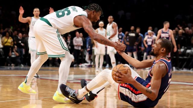 Boston Celtics guard Marcus Smart and Brooklyn Nets forward Kevin Durant