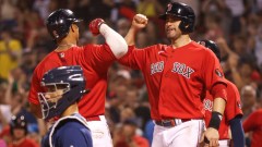 Boston Red Sox designted hitter J.D. Martinez (28) and shortstop Xander Bogaerts (2)