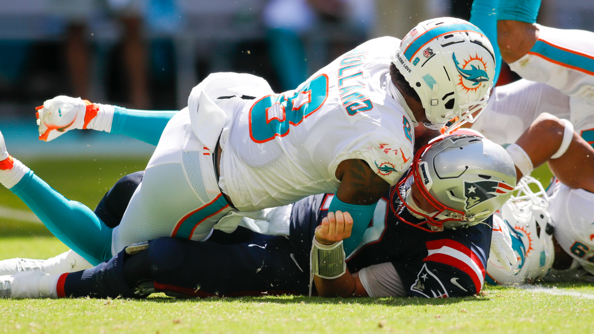 Dolphins' Jevon Holland not fined for hit that gave Mac Jones back