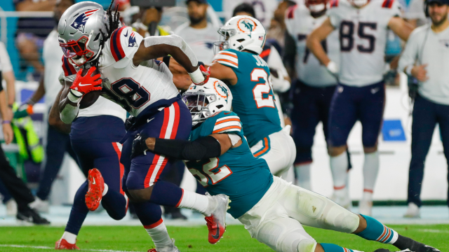 New England Patriots running back Rhamondre Stevenson and Miami Dolphins linebacker Elandon Roberts