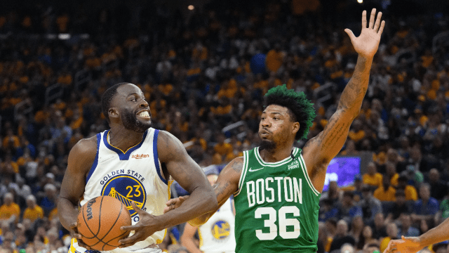 Golden State Warriors forward Draymond Green and Boston Celtics guard Marcus Smart