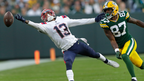 New England Patriots cornerback Jack Jones and Green Bay Packers wide receiver Romeo Doubs