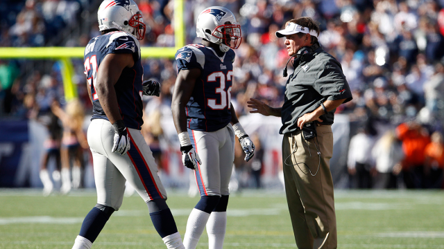 New England Patriots safety Devin McCourty and head coach Bill Belichick