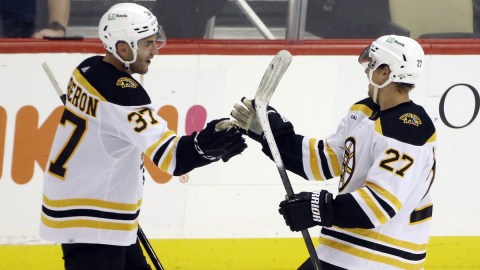 Boston Bruins forward Patrice Bergeron and defenseman Hampus Lindholm