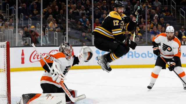 Boston Bruins left wing Nick Foligno, Philadelphia Flyers goaltender Carter Hart