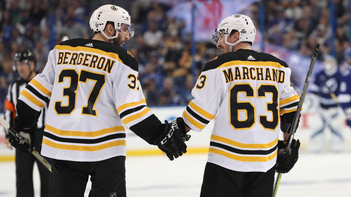 Patrice Bergeron, Brad Marchand share emotional moment after Panthers  eliminate Bruins