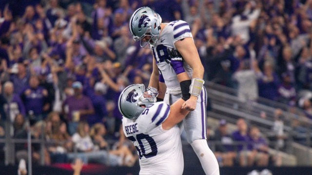 Kansas State Wildcats offensive lineman Cooper Beebe and quarterback Will Howard