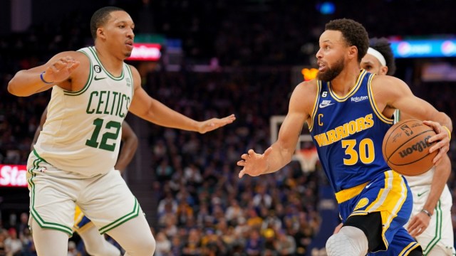 Boston Celtics forward Grant Williams and Golden State Warriors guard Stephen Curry