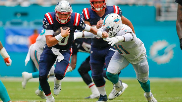 New England Patriots quarterback Mac Jones and Miami Dolphins defensive end Emmanuel Ogbah