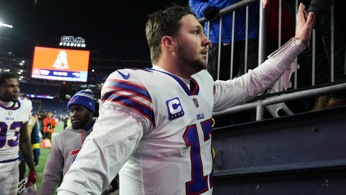 Buffalo Bills quarterback Josh Allen warms up in a signed Ryan Fitzpatrick  Bills jersey