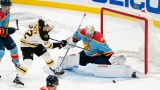 Boston Bruins forward Craig Smith and Florida Panthers goaltender Alex Lyon