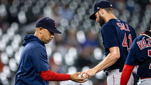 Boston Red Sox manager Alex Cora and pitcher Chris Sale