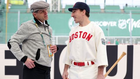 Boston Bruins general manager Don Sweeney and left wing Brad Marchand