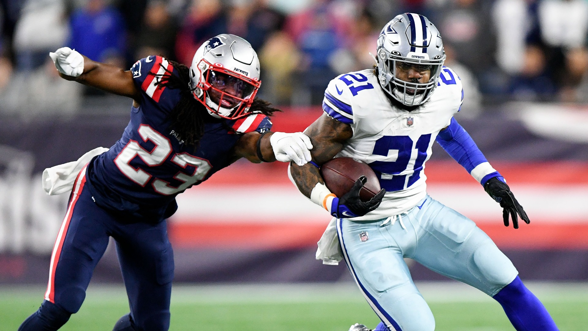 New England Patriots running back Ezekiel Elliott (15) hugs