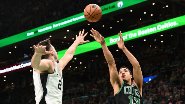 Boston Celtics guard Malcolm Brogdon and San Antonio Spurs forward Zach Collins