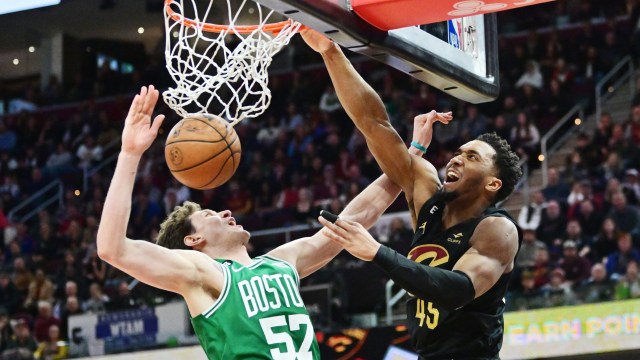 Boston Celtics center Mike Muscala and Cleveland Cavaliers guard Donovan Mitchell