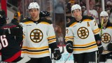 Boston Bruins forward Taylor Hall and defenseman Charlie McAvoy