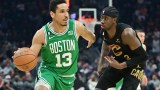 Boston Celtics guard Malcolm Brogdon and Cleveland Cavaliers guard Caris LeVert