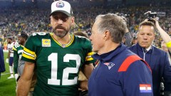 New York Jets quarterback Aaron Rodgers and New England Patriots head coach Bill Belichick