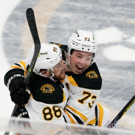 Bear Hug!!! Boston Bruins Goaltender, Linus Ullmark, congratulates