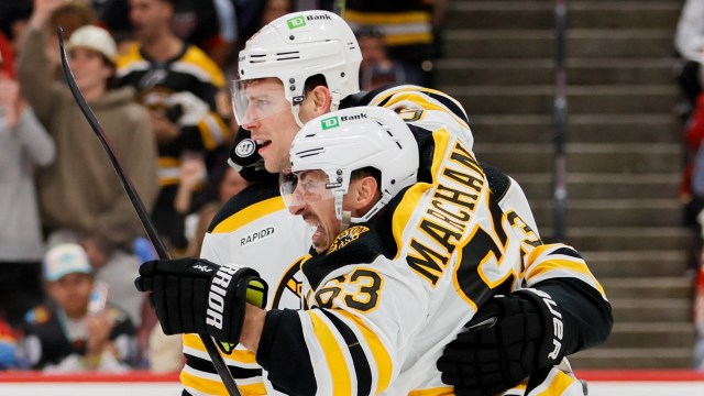 Boston Bruins forwards Brad Marchand and Charlie Coyle
