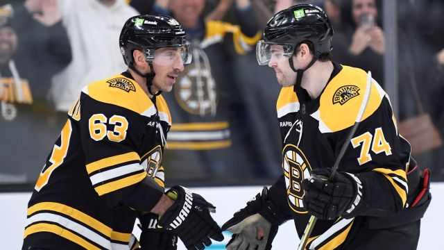 Boston Bruins teammates Brad Marchand, Jake DeBrusk