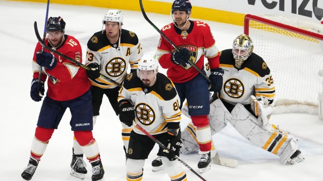 Boston Bruins defensemen Charlie McAvoy, Dmitry Orlov