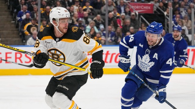 Boston Bruins forward David Pastrnak and Toronto Maple Leafs defenseman Morgan Rielly
