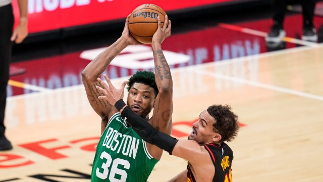 Boston Celtics guard Marcus Smart and Atlanta Hawks guard Trae Young